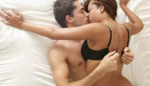 man and lady in bed