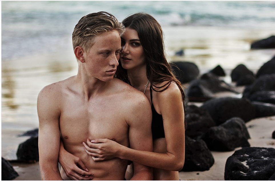 a couple in a romantic moment on beach